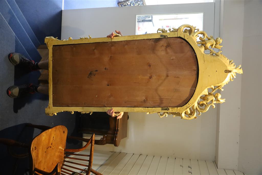 A pair of 19th century French carved giltwood wall mirrors, W.2ft 3in. H.5ft 1in.